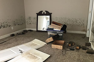 Bedroom with damage due to flooding